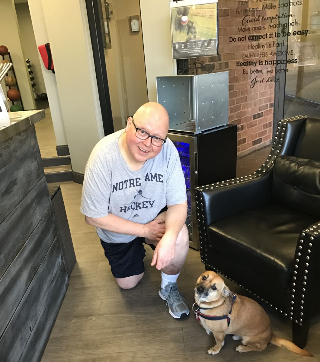 joe kneeling with dog